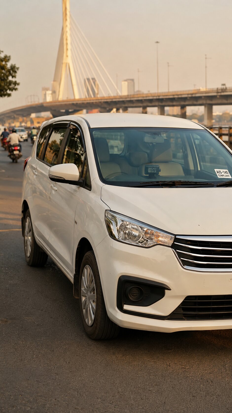 White Maruti Ertiga or Toyota Innova cab on a wide Surat road with the softly blurred outline of the Tapi River bridge or a modern Surat flyover visible in the background. GPS device mounted on the dashboard visible through the windshield.